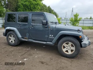 2008 Jeep Wrangler Unlimited X with VIN 1J4GA39108L559478, listed as a Copart auction lot 58937685 with 267,140 mi miles and Clean title. Bid and sale history available at DreamBid. Image 4.