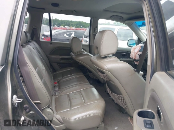 2006 Honda Pilot EX-L with VIN 5FNYF18776B011211, listed as a IAAI auction lot 39555749 with 295,998 mi miles and . Bid and sale history available at DreamBid. Image 8.