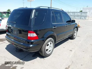 2004 Mercedes-Benz M 350 with VIN 4JGAB57E14A461765, listed as a IAAI auction lot 42532273 with Not provided miles and . Bid and sale history available at DreamBid. Image 4.