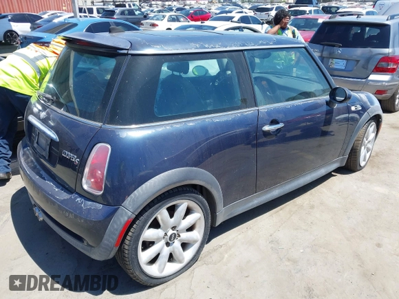 2006 MINI Hardtop S with VIN WMWRE33536TJ35740, listed as a IAAI auction lot 42720196 with 165,852 mi miles and . Bid and sale history available at DreamBid. Image 4.