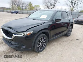 2018 Mazda CX-5 Grand Touring with VIN JM3KFBDM3J0384431, listed as a IAAI auction lot 42013474 with 65,018 mi miles. Bid and sale history available at carsss.com. Image 21.