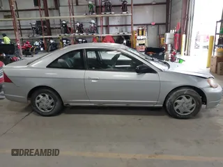 2003 Honda Civic LX with VIN 1HGEM22503L014323, listed as a IAAI auction lot 41505901 with 157,969 mi miles. Bid and sale history available at carsss.com. Image 13.