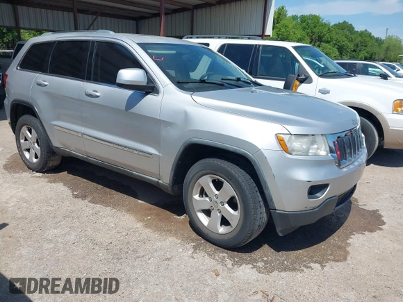 2012 Jeep Grand Cherokee Laredo with VIN 1C4RJEAG4CC167557, listed as a IAAI auction lot 42047720 with 195,631 mi miles. Bid and sale history available at carsss.com. Image 1.
