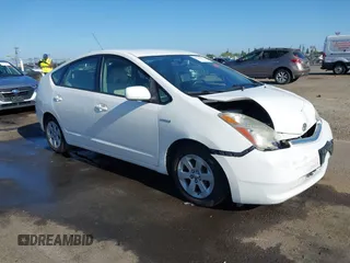 2009 Toyota Prius z VIN JTDKB20U397837461, wystawiony jako IAAI lot #42298507 z przebiegiem 140 507 mil mil oraz . Historia ofert i sprzedaży dostępna na DreamBid. Obrazek 1.