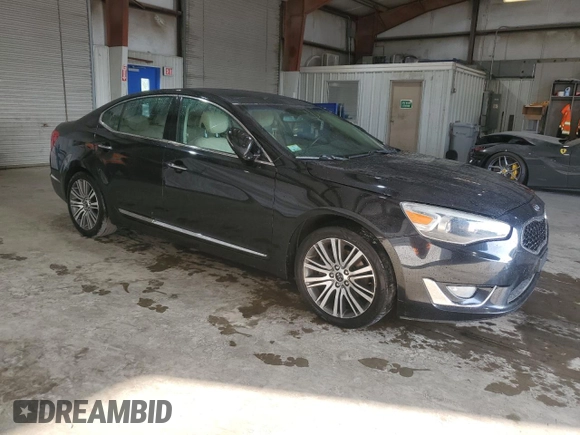 2014 Kia Cadenza Premium with VIN KNALN4D79E5156140, listed as a Copart auction lot 69282604 with 127,626 mi miles and Clean Title. Bid and sale history available at carsss.com. Image 4.