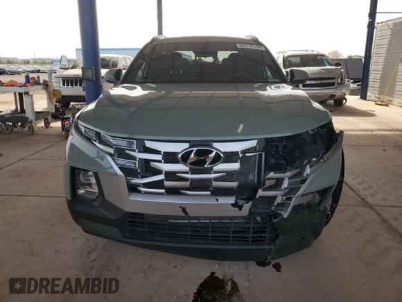 2023 Hyundai Santa Cruz SEL z VIN 5NTJC4AE8PH044985, wystawiony jako Copart lot #84774144 z przebiegiem 11 643 mil mil oraz Szkoda całkowita • Salvage title. Historia ofert i sprzedaży dostępna na DreamBid. Obrazek 5.