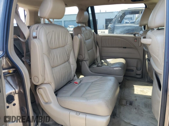 2006 Honda Odyssey EX-L z VIN 5FNRL38726B425098, wystawiony jako Copart lot #56143585 z przebiegiem 153 137 mil mil oraz Szkoda całkowita • Salvage title. Historia ofert i sprzedaży dostępna na DreamBid. Obrazek 11.