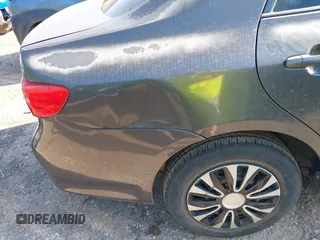 2010 Toyota Corolla with VIN 1NXBU4EE0AZ305870, listed as a IAAI auction lot 42228971 with 208,644 mi miles and . Bid and sale history available at DreamBid. Image 13.