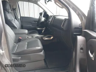2023 Nissan Frontier SV z VIN 1N6ED1EK8PN610121, wystawiony jako IAAI lot #42363879 z przebiegiem 25 505 mil mil oraz . Historia ofert i sprzedaży dostępna na DreamBid. Obrazek 5.