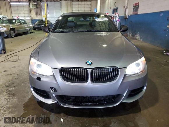2011 BMW 3 Series 335is with VIN WBAKG1C56BE599457, listed as a Copart auction lot 52412655 with 134,497 mi miles and Clean title. Bid and sale history available at DreamBid. Image 5.