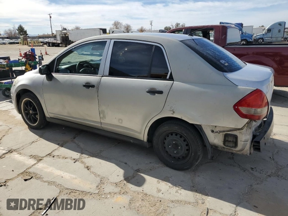 2010 Nissan Versa 1.6 with VIN 3N1CC1AP4AL372566, listed as a Copart auction lot 84704534 with 333,475 mi miles and Salvage Title. Bid and sale history available at carsss.com. Image 2.