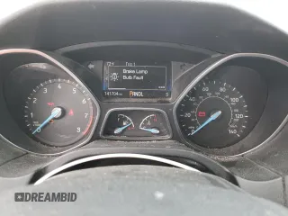2016 Ford Focus SE with VIN 1FADP3F21GL284681, listed as a Copart auction lot 51140975 with 141,704 mi miles and Salvage Title. Bid and sale history available at DreamBid. Image 9.