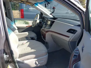 2014 Toyota Sienna XLE z VIN 5TDYK3DC4ES493852, wystawiony jako IAAI lot #42096495 z przebiegiem 145 943 mil mil oraz . Historia ofert i sprzedaży dostępna na DreamBid. Obrazek 5.