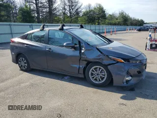 2021 Toyota Prius LE with VIN JTDKAMFP3M3166034, listed as a Copart auction lot 63271275 with 52,536 mi miles and Salvage title. Bid and sale history available at DreamBid. Image 4.