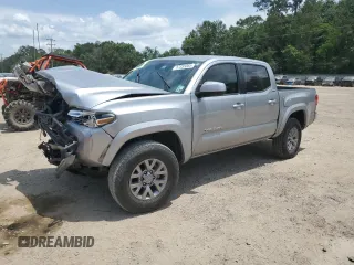 2019 Toyota Tacoma SR5 with VIN 5TFAZ5CN7KX071723, listed as a Copart auction lot 57355065 with 127,710 mi miles and Salvage title. Bid and sale history available at DreamBid. Image 1.