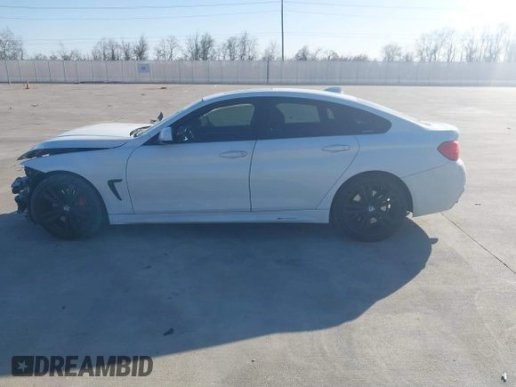 2015 BMW 4 Series 435i with VIN WBA4B1C59FD955497, listed as a IAAI auction lot 41174096 with 101,047 mi miles and . Bid and sale history available at carsss.com. Image 14.