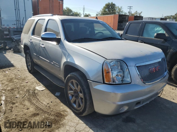 2013 GMC Yukon Denali with VIN 1GKS2EEF0DR311141, listed as a Copart auction lot 74823594 with 125,580 mi miles and Salvage Title. Bid and sale history available at carsss.com. Image 4.