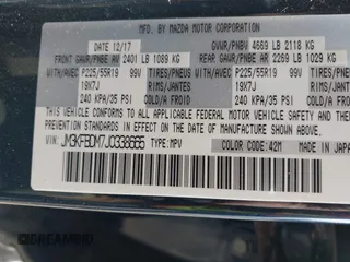 2018 Mazda CX-5 Grand Touring with VIN JM3KFBDM7J0338665, listed as a IAAI auction lot 41546019 with 141,740 mi miles. Bid and sale history available at carsss.com. Image 9.