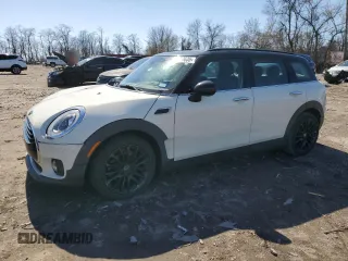 2016 MINI Clubman z VIN WMWLN5C52G2E30372, wystawiony jako Copart lot #50320635 z przebiegiem 57 645 mil mil oraz Szkody całkowita. Historia ofert i sprzedaży dostępna na DreamBid. Obrazek 1.