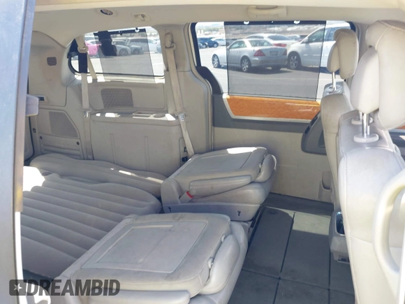 2010 Chrysler Town & Country Limited with VIN 2A4RR7DX1AR357668, listed as a IAAI auction lot 42173545 with 114,486 mi miles and . Bid and sale history available at carsss.com. Image 8.
