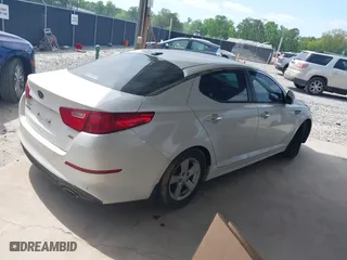 2015 Kia Optima LX with VIN KNAGM4A78F5607679, listed as a IAAI auction lot 42095899 with 125,164 mi miles. Bid and sale history available at carsss.com. Image 4.