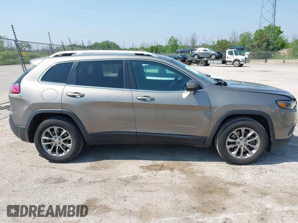 2019 Jeep Cherokee Latitude Plus with VIN 1C4PJMLN8KD148533, listed as a IAAI auction lot 42480637 with 63,473 mi miles and . Bid and sale history available at DreamBid. Image 13.