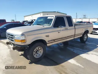 1997 Ford F-250 with VIN 1FTHX25FXVEC79605, listed as a Copart auction lot 73176784 with 283,406 mi miles and Clean Title. Bid and sale history available at DreamBid. Image 1.