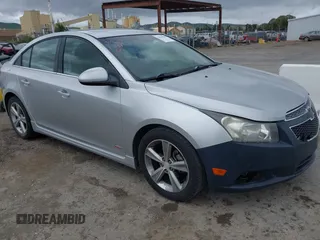 2012 Chevrolet Cruze LT w/2LT with VIN 1G1PG5SC4C7284915, listed as a IAAI auction lot 42064590 with 143,418 mi miles. Bid and sale history available at carsss.com. Image 1.