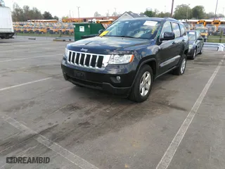 2011 Jeep Grand Cherokee Laredo with VIN 1J4RR4GTXBC538060, listed as a IAAI auction lot 41964694 with 152,999 mi miles. Bid and sale history available at carsss.com. Image 2.