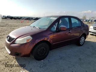 2009 Suzuki SX4 Man FWD with VIN JS2YC412696201399, listed as a Copart auction lot 87543165 with 150,739 mi miles and Salvage Title. Bid and sale history available at carsss.com. Image 1.
