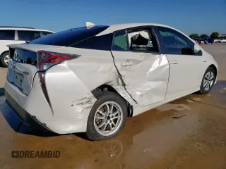 2017 Toyota Prius Two z VIN JTDKARFUXH3038947, wystawiony jako Copart lot #56379015 z przebiegiem 64 230 mil mil oraz Szkoda całkowita • Salvage title. Historia ofert i sprzedaży dostępna na DreamBid. Obrazek 3.