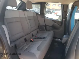 2017 BMW i3 z VIN WBY1Z8C36HV894064, wystawiony jako Copart lot #57879645 z przebiegiem Nie podano mil oraz Szkody całkowita. Historia ofert i sprzedaży dostępna na DreamBid. Obrazek 10.