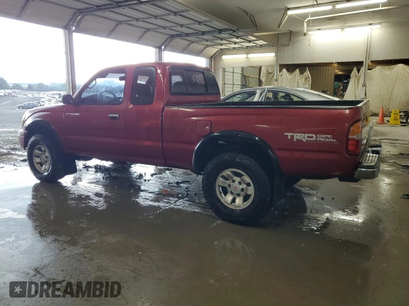 1998 Toyota Tacoma with VIN 4TAWN72NXWZ132180, listed as a Copart auction lot 65593695 with 266,993 mi miles and Salvage title. Bid and sale history available at DreamBid. Image 2.