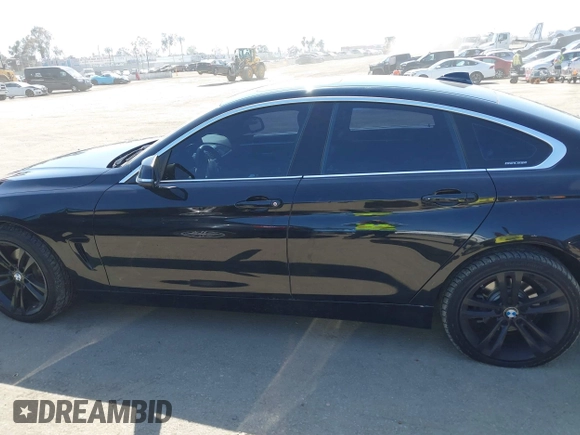 2016 BMW 4 Series 428i xDrive z VIN WBA4C9C58GG141210, wystawiony jako IAAI lot #42218036 z przebiegiem 88 864 mil mil oraz . Historia ofert i sprzedaży dostępna na DreamBid. Obrazek 14.