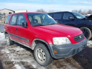 2000 Honda CR-V LX with VIN JHLRD1842YC015881, listed as a IAAI auction lot 41651743 with 97,638 mi miles. Bid and sale history available at carsss.com. Image 1.
