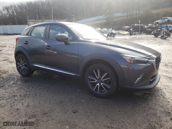 2016 Mazda CX-3 Grand Touring with VIN JM1DKBD75G0109742, listed as a Copart auction lot 70424582 with 62,225 mi miles. Bid and sale history available at carsss.com. Image 4.