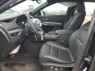 2022 Cadillac XT4 AWD Premium Luxury with VIN 1GYFZDR42NF147920, listed as a Copart auction lot 84058554 with 12,145 mi miles and Salvage Title. Bid and sale history available at carsss.com. Image 7.