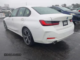 2023 BMW 3 Series 330i with VIN 3MW69FF09P8D02474, listed as a IAAI auction lot 41551264 with 20,238 mi miles. Bid and sale history available at carsss.com. Image 3.
