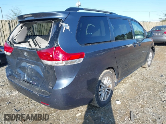 2014 Toyota Sienna XLE with VIN 5TDYK3DC2ES431320, listed as a IAAI auction lot 41977059 with 158,711 mi miles and . Bid and sale history available at DreamBid. Image 4.
