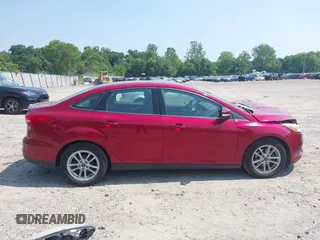 2017 Ford Focus SE z VIN 1FADP3F26HL305624, wystawiony jako IAAI lot #42411111 z przebiegiem 58 865 mil mil oraz . Historia ofert i sprzedaży dostępna na DreamBid. Obrazek 13.