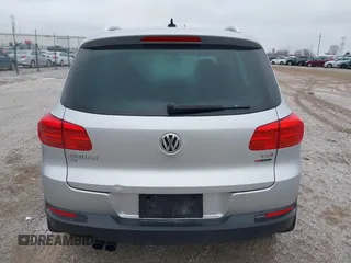 2016 Volkswagen Tiguan SEL z VIN WVGBV7AX3GW594729, wystawiony jako IAAI lot #41233805 z przebiegiem 92 997 mil mil oraz . Historia ofert i sprzedaży dostępna na DreamBid. Obrazek 16.