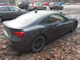 2015 Scion FR-S with VIN JF1ZNAA12F9713465, listed as a IAAI auction lot 41199978 with 96,993 mi miles. Bid and sale history available at carsss.com. Image 4.