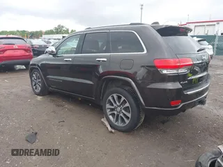 2017 Jeep Grand Cherokee Overland z VIN 1C4RJFCG7HC800403, wystawiony jako IAAI lot #42309664 z przebiegiem 98 389 mil mil oraz . Historia ofert i sprzedaży dostępna na DreamBid. Obrazek 3.