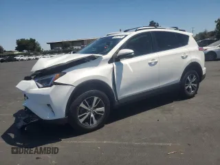 2018 Toyota RAV4 XLE with VIN JTMWFREV2JJ151323, listed as a Copart auction lot 58637145 with 95,438 mi miles and Salvage title. Bid and sale history available at DreamBid. Image 1.