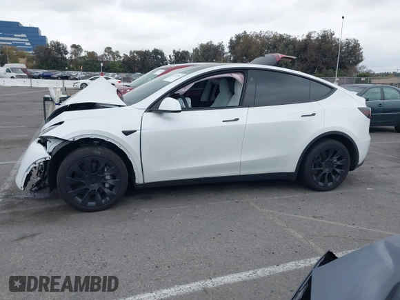 2024 Tesla Model Y with VIN 7SAYGDED6RF166543, listed as a IAAI auction lot 41713362 with Not Provided miles and . Bid and sale history available at DreamBid. Image 14.