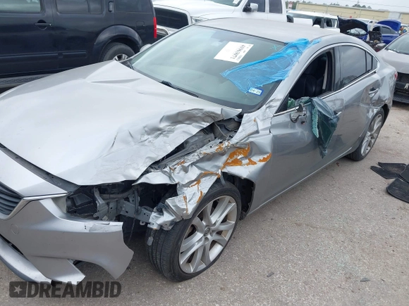 2014 Mazda Mazda6 i Touring with VIN JM1GJ1V59E1105417, listed as a IAAI auction lot 41963071 with 167,985 mi miles. Bid and sale history available at carsss.com. Image 6.