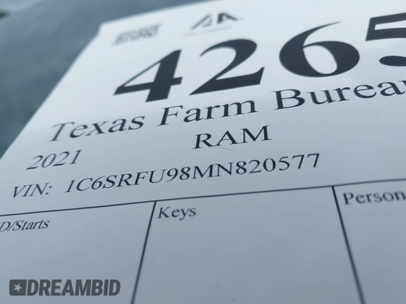 2021 Ram 1500 TRX with VIN 1C6SRFU98MN820577, listed as a IAAI auction lot 42652005 with 43,429 mi miles and . Bid and sale history available at DreamBid. Image 9.