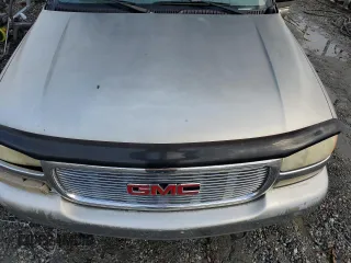 2001 GMC Yukon SLT z VIN 1GKEC13T51J145673, wystawiony jako Copart lot #83568954 z przebiegiem 310 415 mil mil oraz Szkoda całkowita • Salvage title. Historia ofert i sprzedaży dostępna na DreamBid. Obrazek 12.