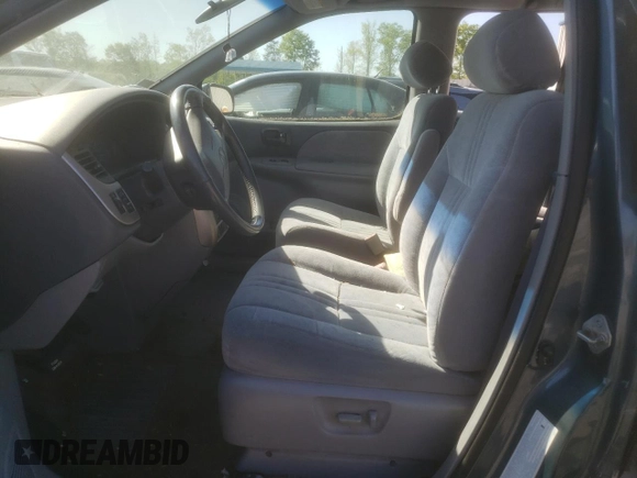 2002 Toyota Sienna LE with VIN 4T3ZF13C22U497021, listed as a Copart auction lot 52571055 with 232,973 mi miles and Salvage Title. Bid and sale history available at DreamBid. Image 7.
