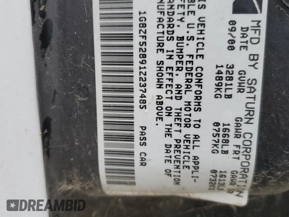 2001 Saturn SL with VIN 1G8ZF52891Z237485, listed as a Copart auction lot 76174574 with 130,525 mi miles and Salvage title. Bid and sale history available at DreamBid. Image 12.